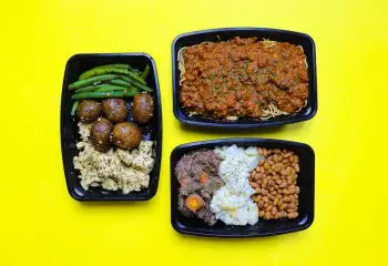 Three HealthyWay meals on a yellow background.